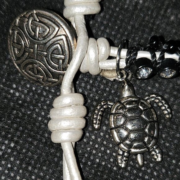 Bracelet with Rhinestones Set in Black Beads with White Tie and Turtle Charm - Picture 1 of 9
